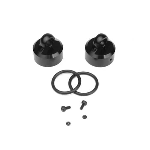 TKR8702 – Shock Caps (7075, emulsion/vented/standard, black ano, 2pcs) Tekno